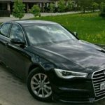 Черный седан Ауди A6