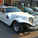 Белый автомобиль Экскалибур Фантом